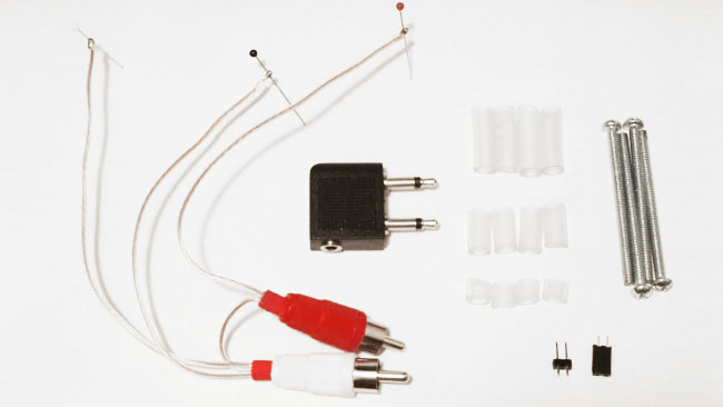 Your kit contains a 2-channel electrode, a 2-channel adaptor, 12 spacers, 4 two inch screws, and a header pair.