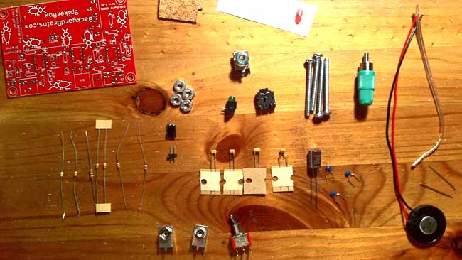 What's in the kit?  8 Capacitors, 7 Resistors, 1 PCB, 2 cork stickers, 1 logo decal, 2 needles, a speaker, a 1x2 speaker connector, speaker wire, RCA connector, RCA plug, a switch, LED, 2x battery connectors, 1/8 inch (headphone) connector + screws, nuts and enclosure.
