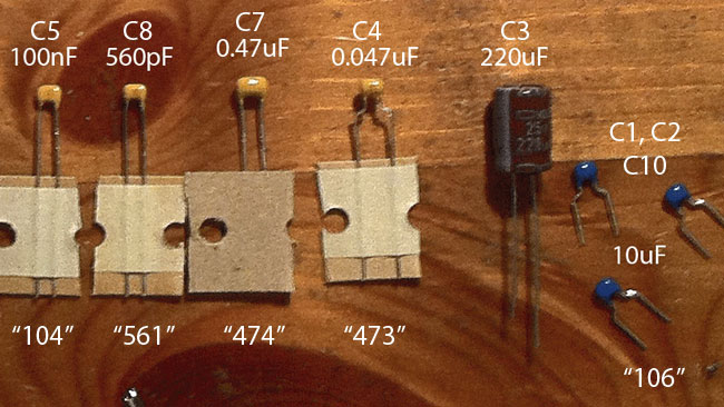 Identify all of the capacitors based on the 3-digit value code that appears on each cap.  A magnifying glass helps.